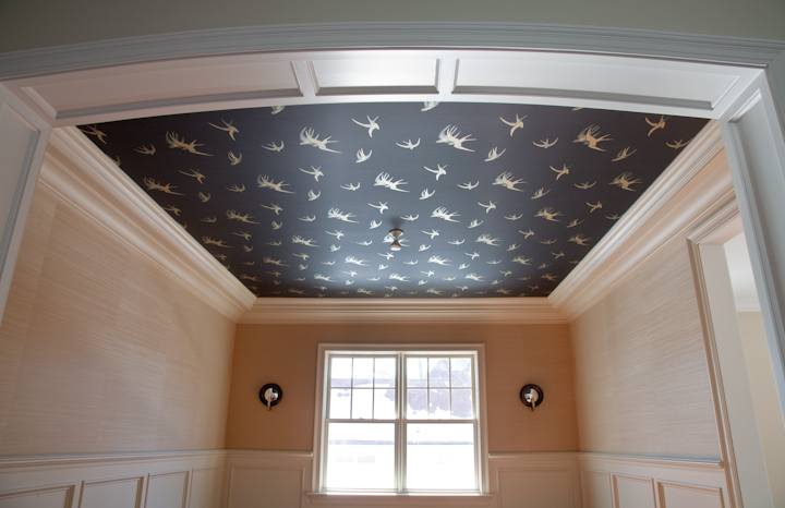 Finished wallpaper installation and interior wallcovering detail.