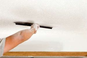 professional painters remove popcorn ceilings