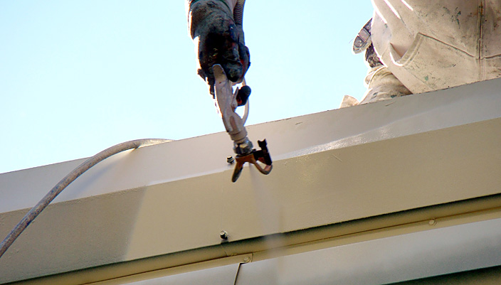 exterior painting with a sprayer