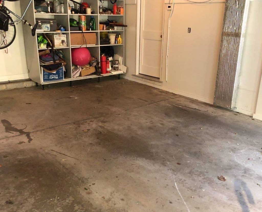 garage floor that is old and stained