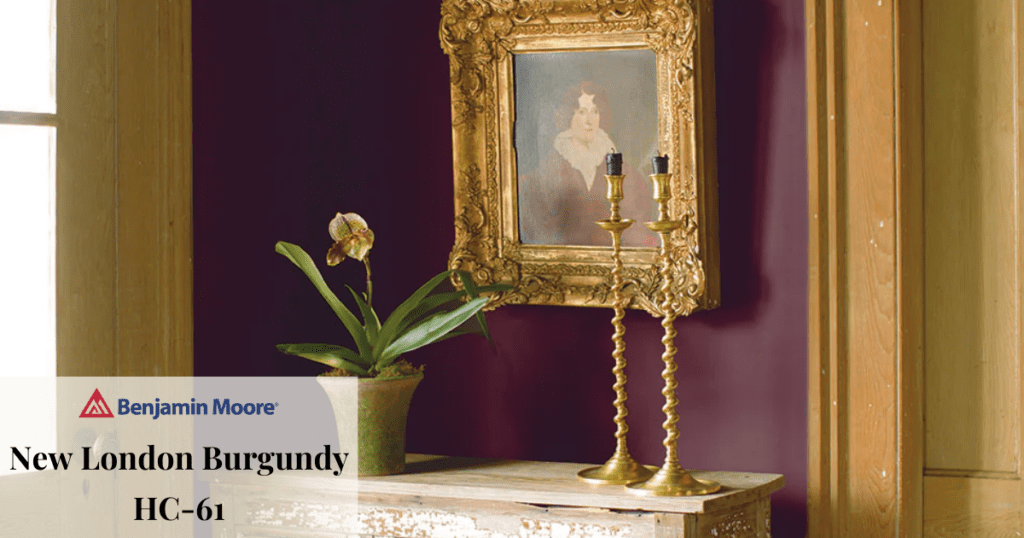 A traditional interior wall painted in Benjamin Moore's "New London Burgundy" HC-61 with antique-style decor.