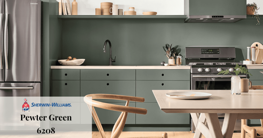 A modern kitchen with walls and cabinetry painted in Sherwin-Williams' "Pewter Green" 6208, with light wood accents.